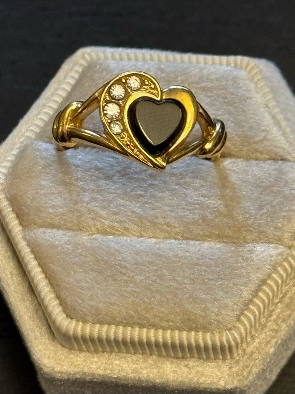 Vintage Avon gold tone ring from 1992 featuring a black onyx heart stone